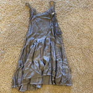 Tiered grey blouse with some detail around the arms